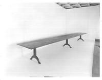 SA0637a - Photo of an unidentified long trestle table.
